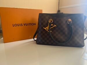 Negociazo! Mujer compra cartera Louis Vuitton original en $26