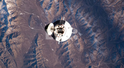 Fotografía cedida por la NASA donde se muestra la nave espacial Dragon Freedom de SpaceX